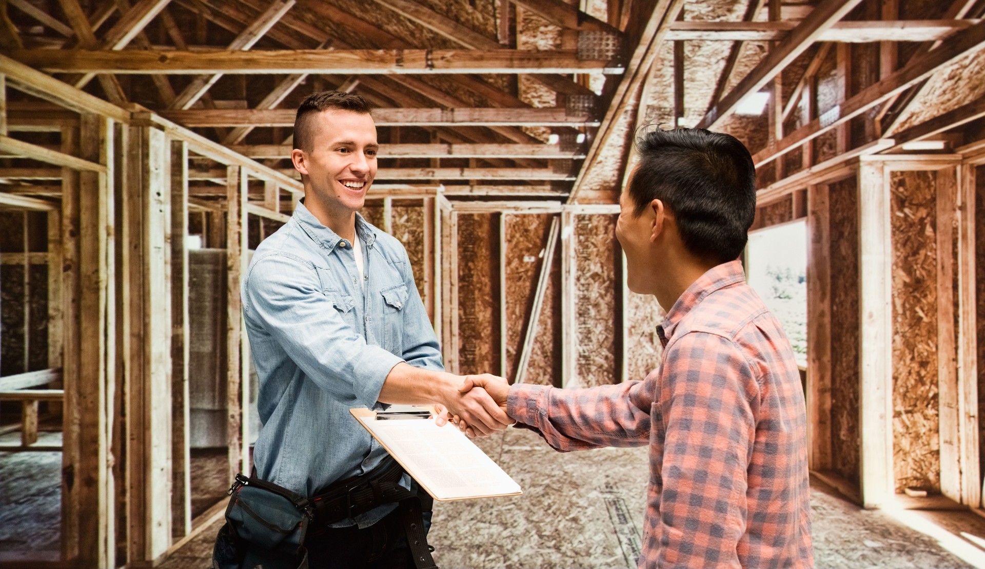 Carpenter shaking hand with customer